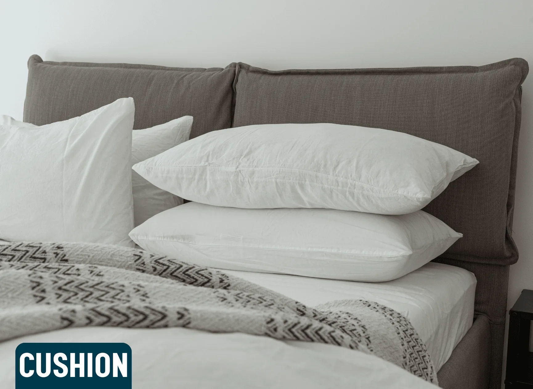 Decorative Cushion: "A decorative cushion with a geometric pattern in vibrant colors, placed on a sofa in a modern living room setting." Cushion on a Bed: "A soft, plush cushion resting on a neatly made bed, adding comfort and style to the bedroom decor." Cushion with Floral Design: "A cushion featuring a colorful floral design, placed on an armchair. The cushion's fabric is soft to the touch and adds a fresh, natural vibe to the room." Throw Cushion Set: "A set of throw cushions in various sizes and colors, arranged neatly on a couch. The cushions add texture and warmth to the living space."
